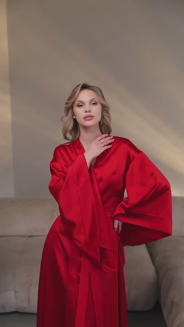 Video of a red floor-length silk satin kimono robe in motion