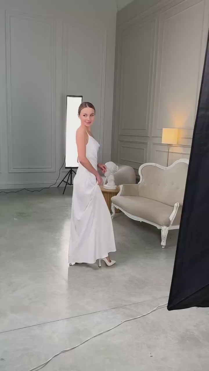 Video of white satin maxi slip dress with draped cowl neckline