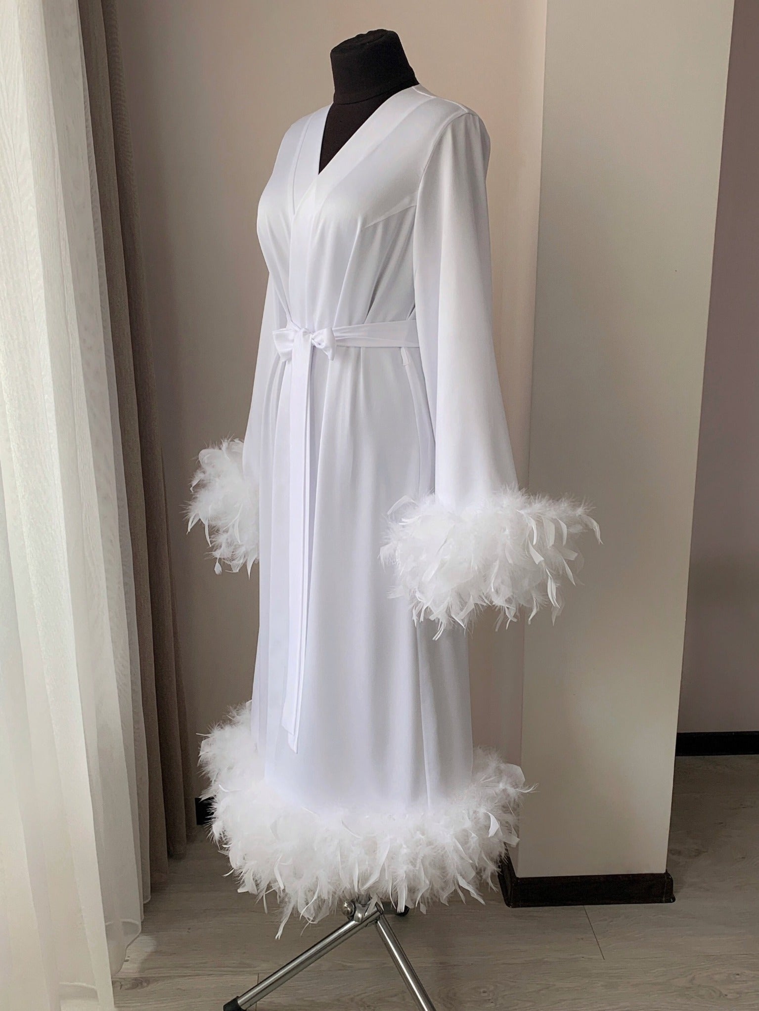 white feather robe