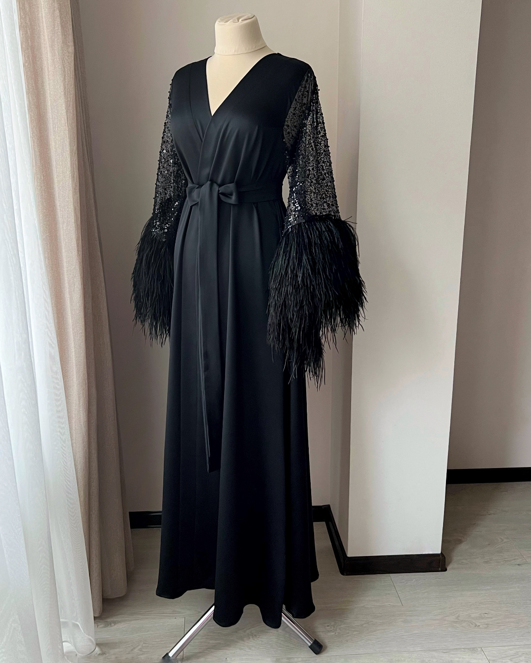 black feather robe