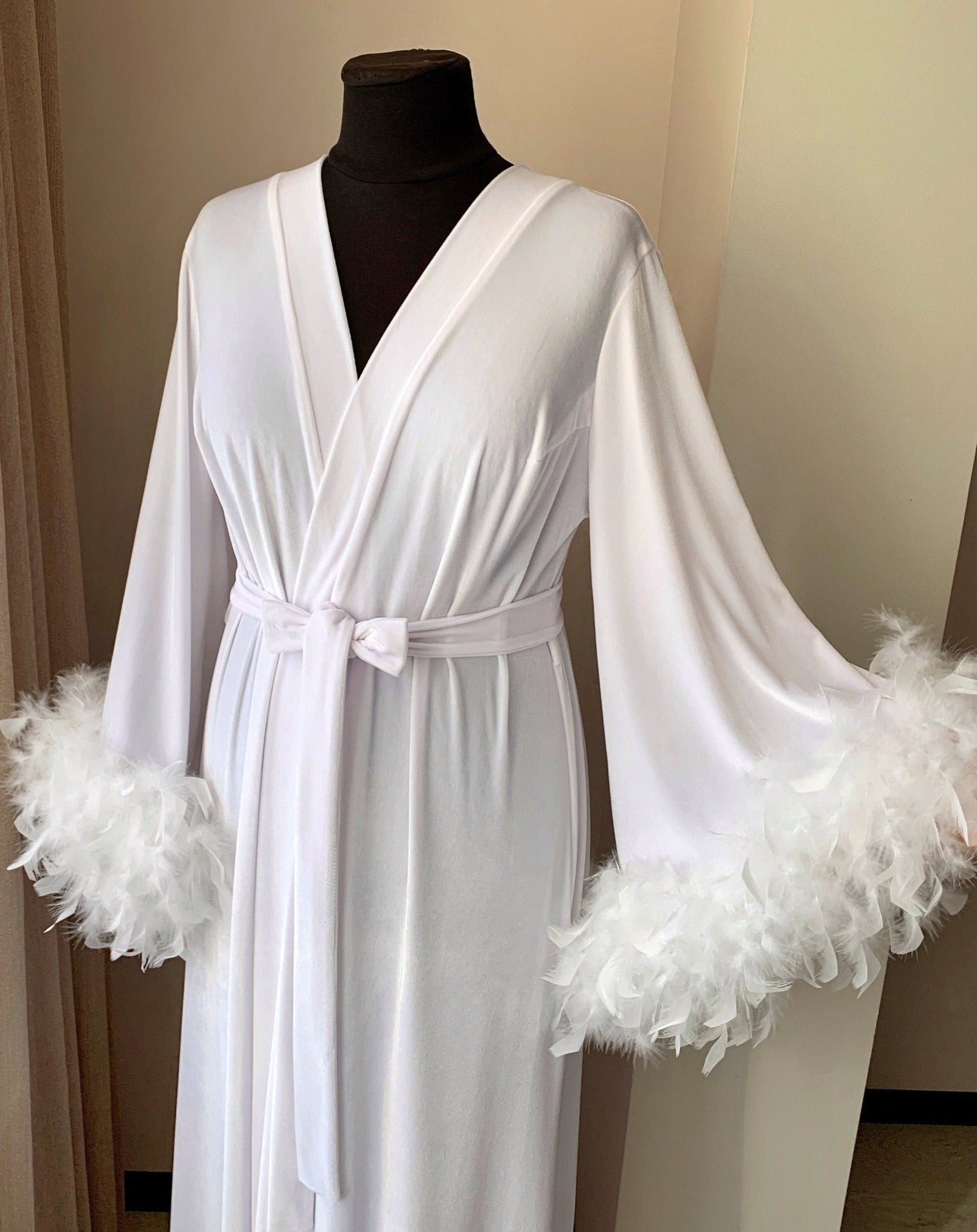 Velvet robe with feathers